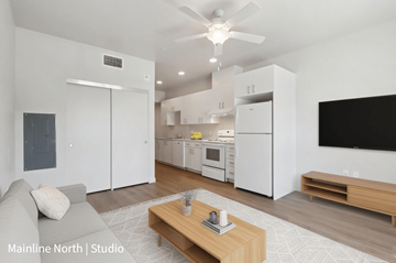 Santa Clara apartment for rent - A modern living room with a grey sofa and a wooden coffee table.