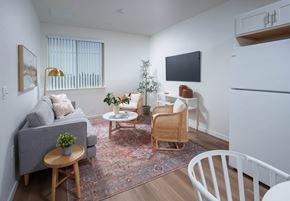 Folsom apartment for rent - a living room with white walls and hardwood-look floors