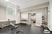 St. Louis apartment for rent - Gym with free weights and medicine balls  at The Embassy in St. Louis, 63108