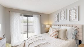 Dublin apartment for rent - a bedroom with a large bed and a window at Karric Place of Dublin Apartments, Ohio, 43016