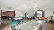Cordova townhouse for rent - A room with a pool table and a billiard table.