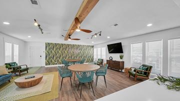 Memphis apartment for rent - A living room with a wooden table and chairs.