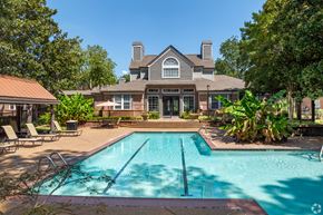 Germantown apartment for rent - a swimming pool with a house in the background at The Grove Germantown Apartments, Germantown, 38138 ?