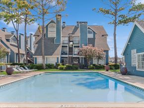 Houston apartment for rent - A pool with a sign that says "3 FT. SHOULD NOT DINING" in front of a house.