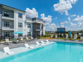 Seguin apartment for rent - A swimming pool in front of apartment buildings at The Virginia Apartments , Texas, 78155