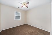 Galloway apartment for rent - a bedroom with carpet and a ceiling fan
