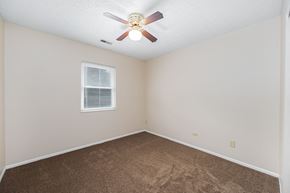 Galloway apartment for rent - a bedroom with carpet and a ceiling fan