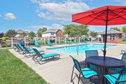 Hilliard townhouse for rent - our apartments offer a swimming pool with chairs and umbrellas