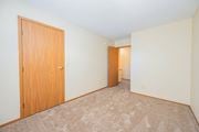 Dublin apartment for rent - a bedroom with a closet and a door to a hallway