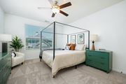 Delaware apartment for rent - a bedroom with a bed and a ceiling fan
