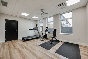 Columbus apartment for rent - the heights gym with exercise equipment and windows