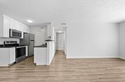 Marysville apartment for rent - A kitchen with white cabinets and appliances.