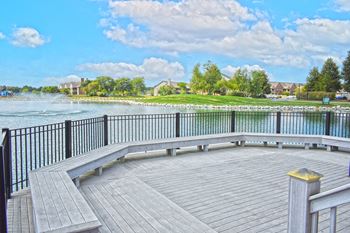 Large pool deck overlooking lake