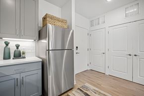 Columbus apartment for rent - A modern kitchen with a stainless steel refrigerator and wooden countertop.