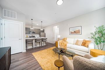 Westerville apartment for rent - A living room with a white couch and a coffee table.