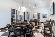 Delaware apartment for rent - a dining room with a table and chairs and a pool table