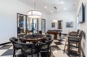 Delaware apartment for rent - a dining room with a table and chairs and a pool table