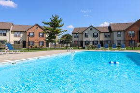 Galloway townhouse for rent - a swimming pool with apartments in the background