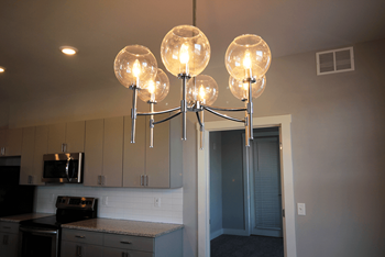 Designer finishes and light fixtures with dimming features throughout your entire home