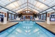 Columbus apartment for rent - a large indoor swimming pool with a glass ceiling and skylights