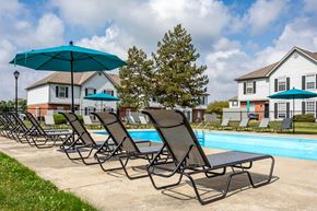 Reynoldsburg townhouse for rent - our apartments have a pool and lounge chairs