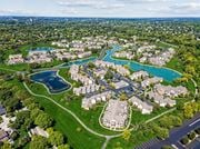 Dublin townhouse for rent - A bird's eye view of a residential neighborhood with a large swimming pool.