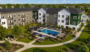 Marysville apartment for rent - An aerial view of a resort with a swimming pool and apartment buildings.