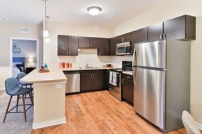 Columbus apartment for rent - the preserve at ballantyne commons apartment kitchen and dining area