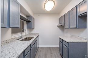 Atlanta apartment for rent - A kitchen with a sink and cabinets.