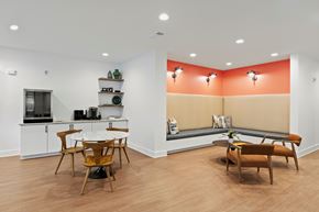 Atlanta apartment for rent - A kitchen with a dining table and chairs.