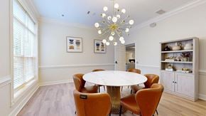 Atlanta apartment for rent - A dining room with a round table and chairs.