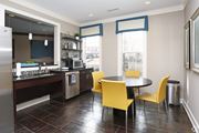 Atlanta apartment for rent - A kitchen with a table and chairs.