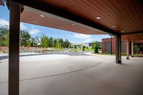 Atlanta apartment for rent - a view of the pool area from under a wood canopy