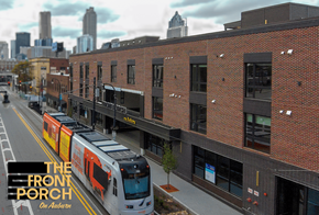Atlanta apartment for rent - A train is on a track in front of a building.