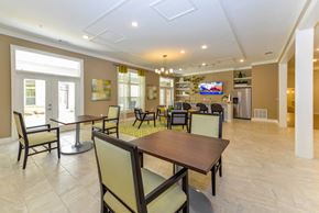 Roswell apartment for rent - A dining room with a table and chairs.