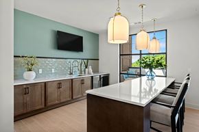 Atlanta apartment for rent - a kitchen with a large island and a table with chairs