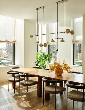 Brooklyn apartment for rent - A dining room with a wooden table and chairs.