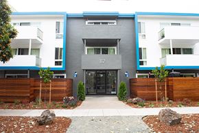 Redwood City apartment for rent - the front entrance of a modern apartment building