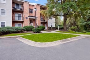 Gaithersburg apartment for rent - Apartment building with a street in front.