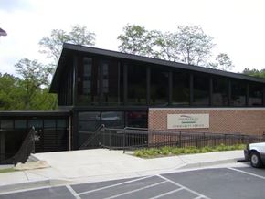 Baltimore City apartment for rent - A building with a sign that says Greenpeace Community Center.