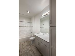 Arlington apartment for rent - Bathroom with Vanity Lights at Apex Apartments, Arlington, 22206
