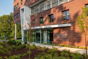 Alexandria apartment for rent - a large brick building with the word spire on it