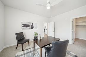 Madison apartment for rent - a dining room with a wooden table and chairs