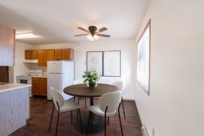 Dilworth apartment for rent - A dining room with a table and chairs. Fargo, ND Fieldstone Apartments