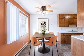 Fargo apartment for rent - A dining room with a table and chairs. Fargo, ND Carr Apartments