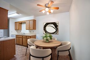 Fargo apartment for rent - A dining room with a round table and chairs.