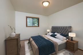 Fargo apartment for rent - Fargo, ND Cedars 2 Apartments a bedroom with a bed and two night stands