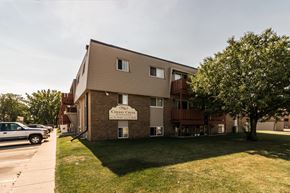 Grand Forks apartment for rent - Grand Forks, ND Cherry Creek Apartments. Exterior with trees