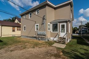 Grand Forks apartment for rent - Grand Forks, ND Faul 4 Plex. A view of the back of the house from the driveway