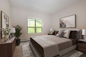 Eagan apartment for rent - Eagan, MN Glen Pond Addition Apartments. A bedroom with a large bed and a large window
